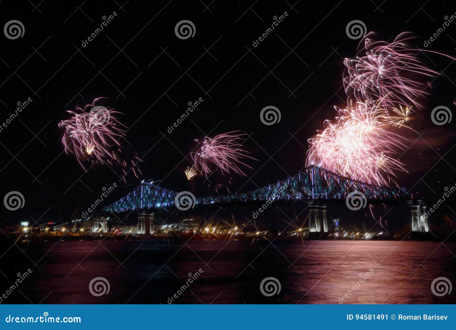colorful fireworks explode over bridge. montrealÃ¢â¬â¢s 375th anniversary. luminous colorful interactive jacques c